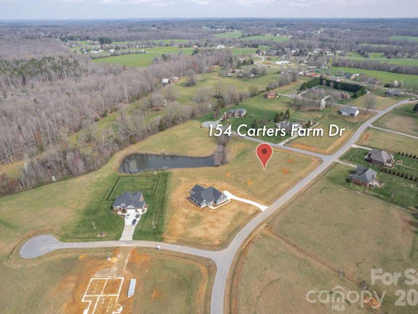 154 Carters Farm Drive, Statesville, NC 28625.  MLS# CAR4240433, YatesRealty ID 3723. Aerial View of Pond Lot