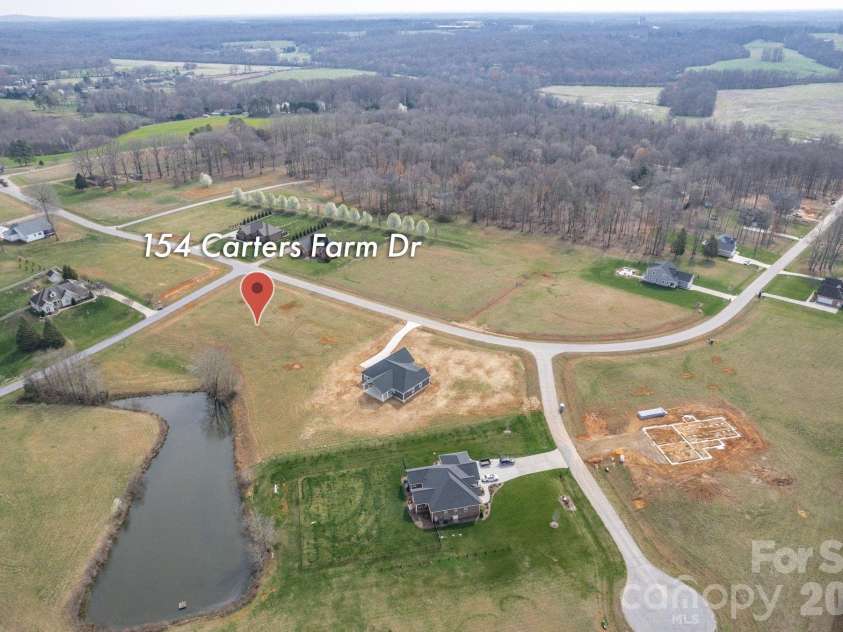154 Carters Farm Drive, Statesville, NC 28625.  MLS# CAR4240433, YatesRealty ID 3723. Aerial View of Pond Lot