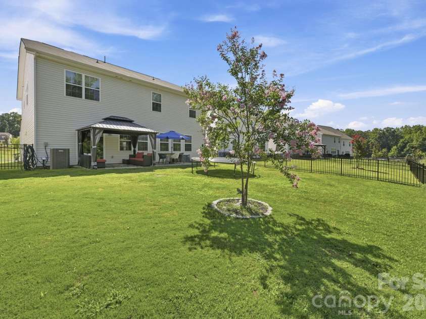 328 Kennerly Center Drive, Mooresville, NC 28115.  MLS# CAR4404811, YatesRealty ID 37231. Back Yard