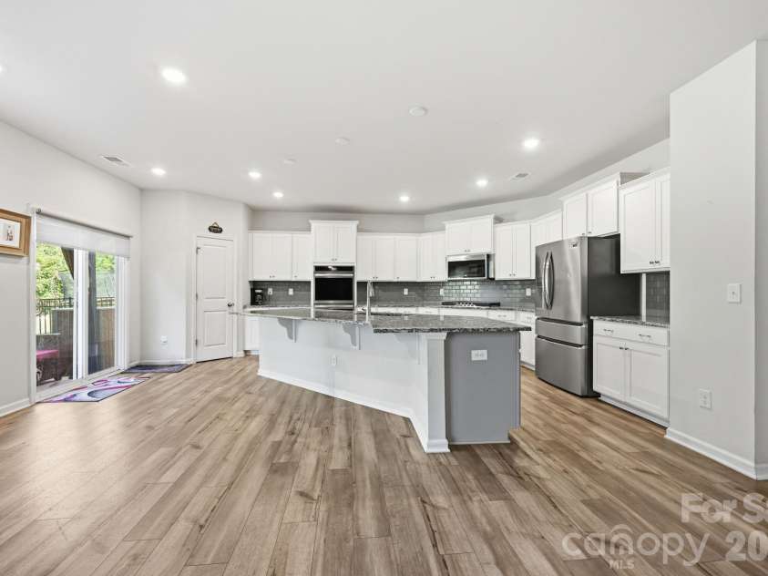 328 Kennerly Center Drive, Mooresville, NC 28115.  MLS# CAR4404811, YatesRealty ID 37231. Breakfast Area and Kitchen