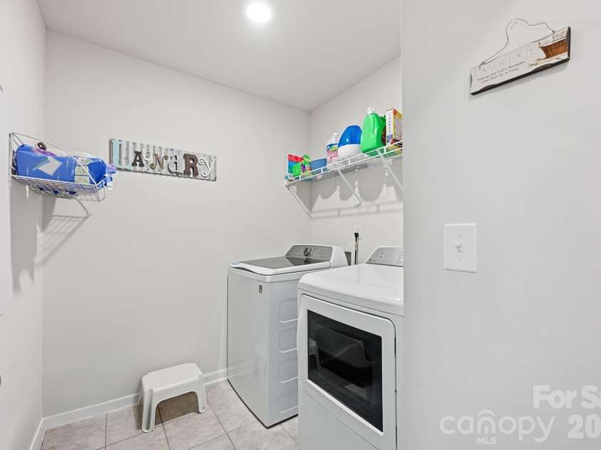 328 Kennerly Center Drive, Mooresville, NC 28115.  MLS# CAR4404811, YatesRealty ID 37231. Laundry Room on Upper Level