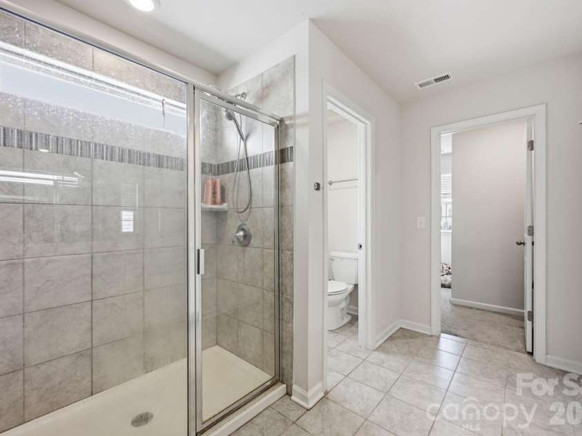 328 Kennerly Center Drive, Mooresville, NC 28115.  MLS# CAR4404811, YatesRealty ID 37231. Primary Bath