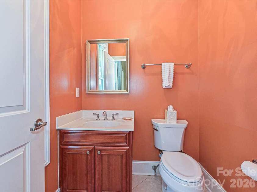 21816 Chapel Way, Cornelius, NC 28031.  MLS# CAR4400108, YatesRealty ID 37244. Powder room on the main level