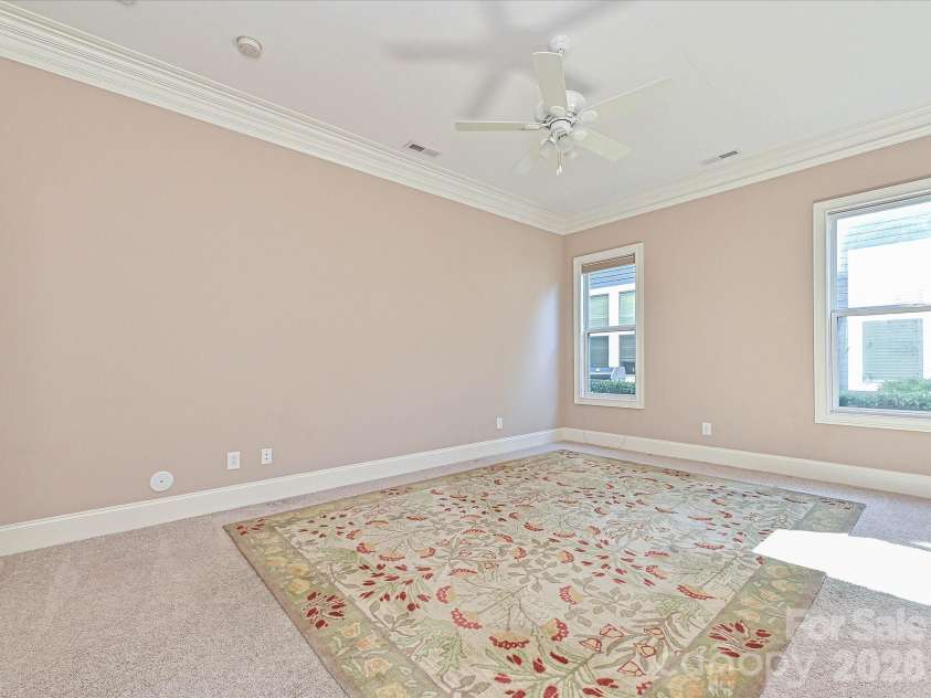 21816 Chapel Way, Cornelius, NC 28031.  MLS# CAR4400108, YatesRealty ID 37244. Primary Bedroom on the main level with crown molding