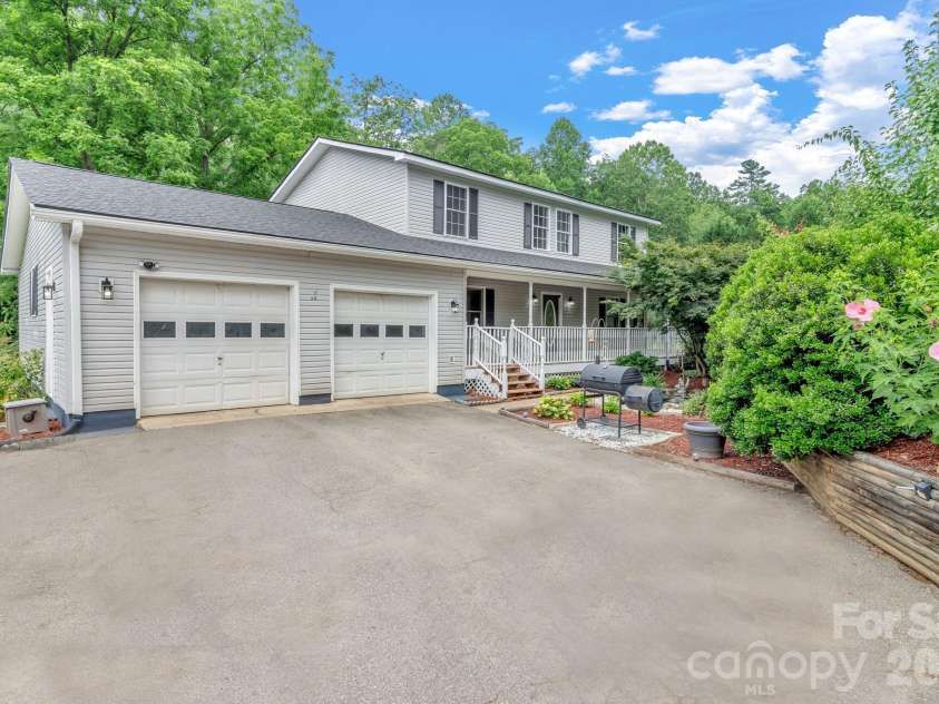 11 Aquarian Way, Leicester, NC 28748.  MLS# CAR4399952, YatesRealty ID 37257. Charming home