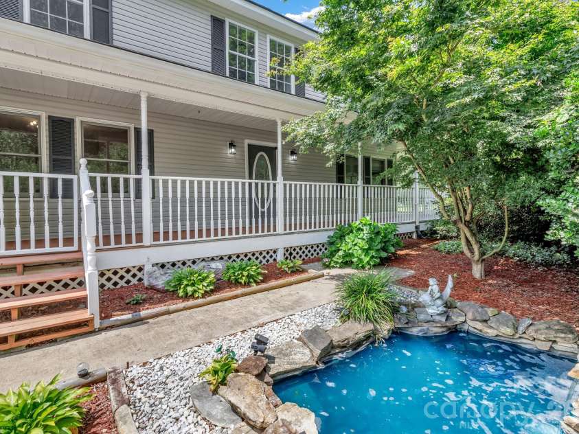 11 Aquarian Way, Leicester, NC 28748.  MLS# CAR4399952, YatesRealty ID 37257. Cute water feature