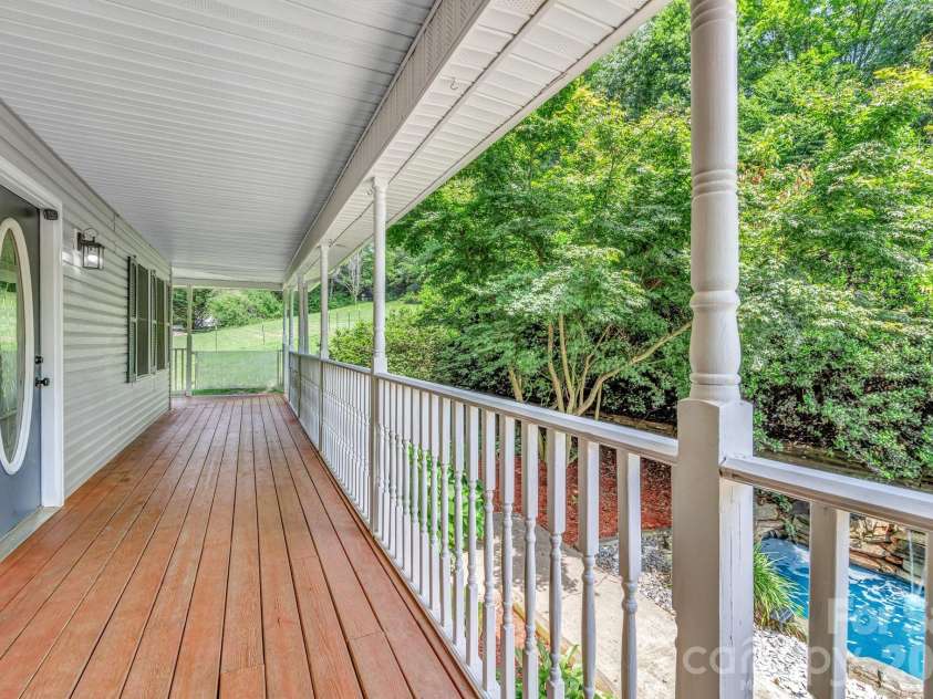 11 Aquarian Way, Leicester, NC 28748.  MLS# CAR4399952, YatesRealty ID 37257. Expansive deck
