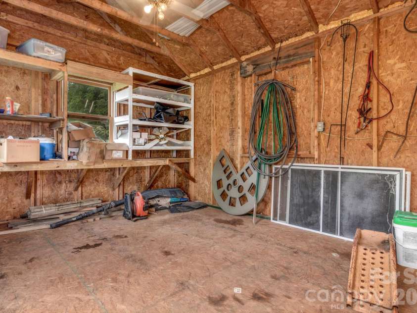 11 Aquarian Way, Leicester, NC 28748.  MLS# CAR4399952, YatesRealty ID 37257. Inside storage shed