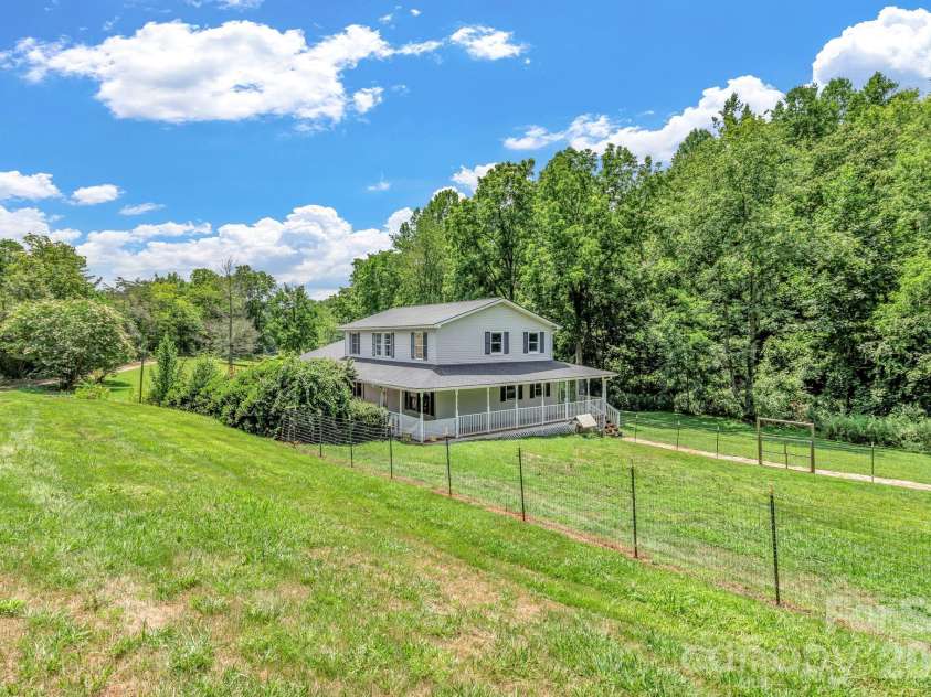 11 Aquarian Way, Leicester, NC 28748.  MLS# CAR4399952, YatesRealty ID 37257. Large yard