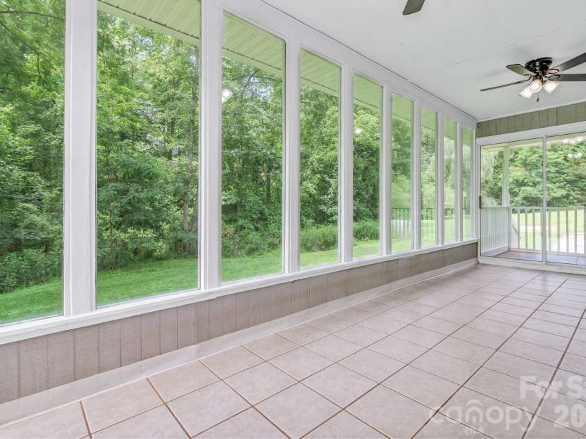 11 Aquarian Way, Leicester, NC 28748.  MLS# CAR4399952, YatesRealty ID 37257. Sunroom
