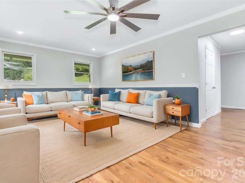 11 Aquarian Way, Leicester, NC 28748.  MLS# CAR4399952, YatesRealty ID 37257. Virtually staged living room