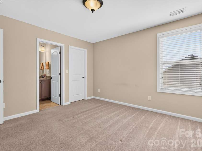 6405 Alba Rose Lane, Huntersville, NC 28078.  MLS# CAR4397325, YatesRealty ID 37262. Bedroom 2 with ensuite