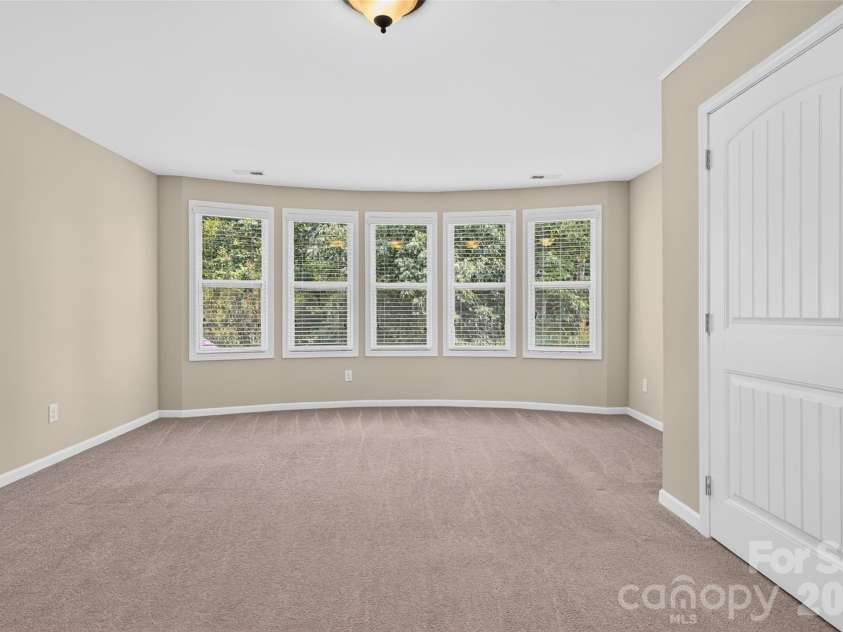 6405 Alba Rose Lane, Huntersville, NC 28078.  MLS# CAR4397325, YatesRealty ID 37262. Bedroom 3 or bonus/flex room. Large closet and double doors for privacy