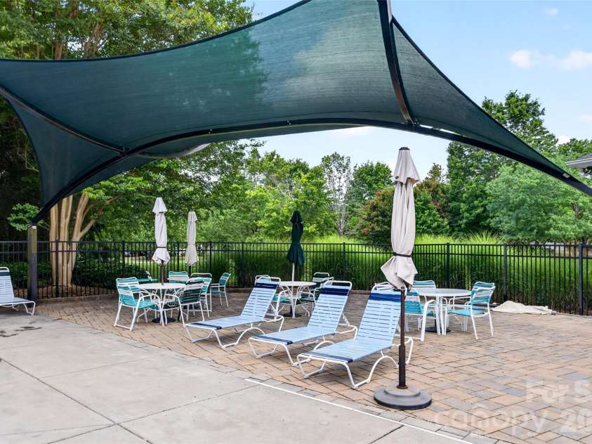 6405 Alba Rose Lane, Huntersville, NC 28078.  MLS# CAR4397325, YatesRealty ID 37262. Large Fabric sail shaded area of pool deck