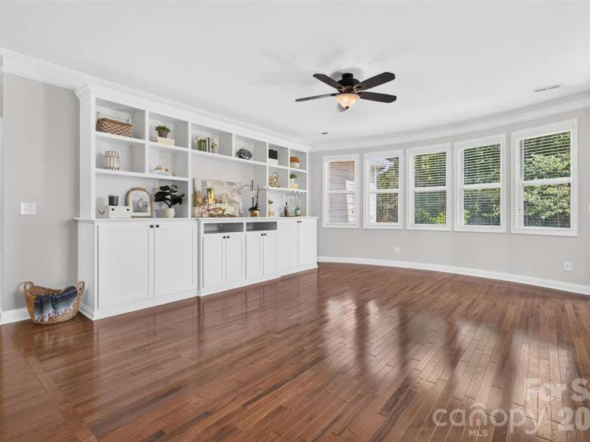 6405 Alba Rose Lane, Huntersville, NC 28078.  MLS# CAR4397325, YatesRealty ID 37262. Large living room with custom built-ins. Tons of storage and electrical inside cabinets.
