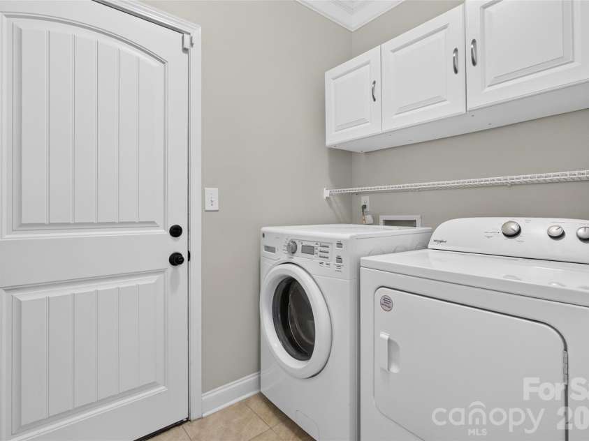 6405 Alba Rose Lane, Huntersville, NC 28078.  MLS# CAR4397325, YatesRealty ID 37262. Laundry/mud room. Extra storage on left side