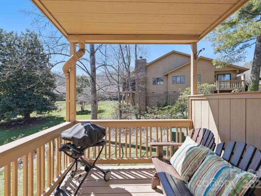 406 Live Oak Lane, Hendersonville, NC 28791.  MLS# CAR4235067, YatesRealty ID 3727. Side porch off breakfast nook
