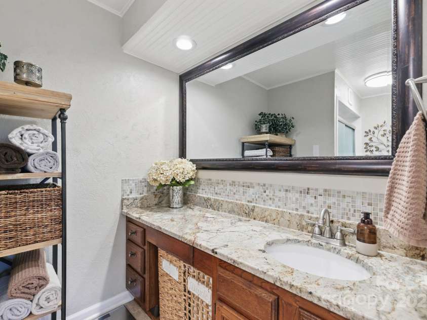 406 Live Oak Lane, Hendersonville, NC 28791.  MLS# CAR4235067, YatesRealty ID 3727. Updated en-suite bath