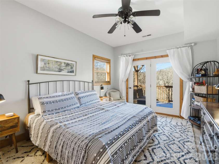 32 Zebulon Lane, Mars Hill, NC 28754.  MLS# CAR4336470, YatesRealty ID 3728. The third bedroom offers a peaceful escape from the rest of the home, making it ideal for guests and/or a restful sleeping area.