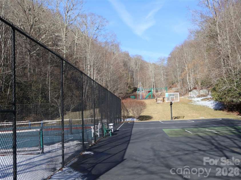 32 Zebulon Lane, Mars Hill, NC 28754.  MLS# CAR4336470, YatesRealty ID 3728. There are so many fun activities: tennis, basketball and one of the playgrounds located just beyond the pavillion.