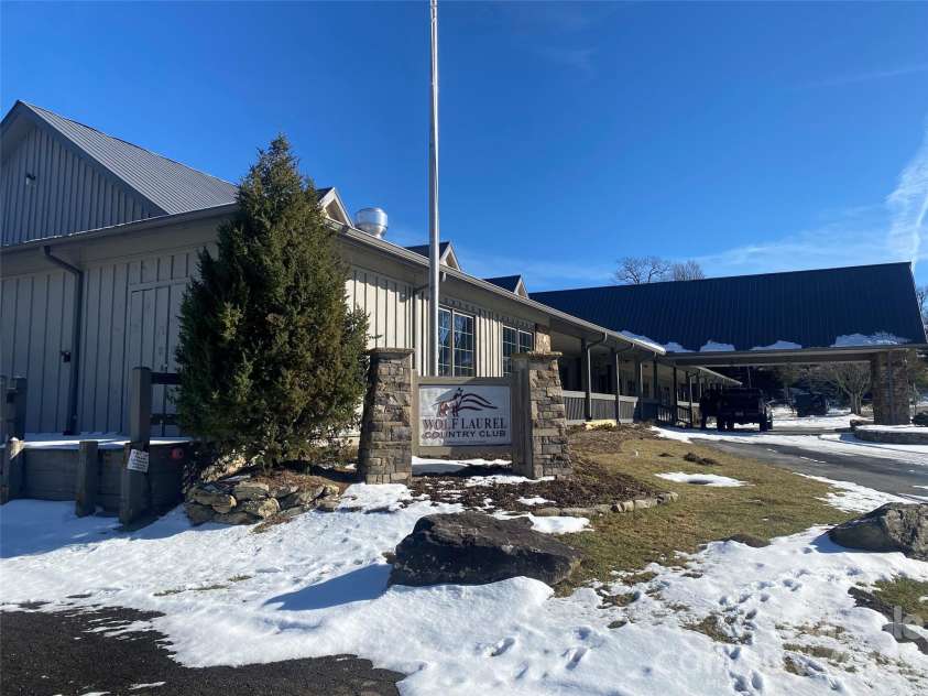 32 Zebulon Lane, Mars Hill, NC 28754.  MLS# CAR4336470, YatesRealty ID 3728. This is the Wolf Laurel Golf and Country Club. While the golf course is closed for the winter, the clubhouse is getting upgrades...including a new roof!