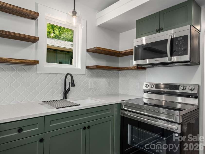 30 Pine Road, Asheville, NC 28805.  MLS# CAR4403930, YatesRealty ID 37308. 
