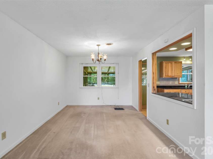 32 Swanns View Drive, Marion, NC 28752.  MLS# CAR4398128, YatesRealty ID 37311. Dining area open to kitchen