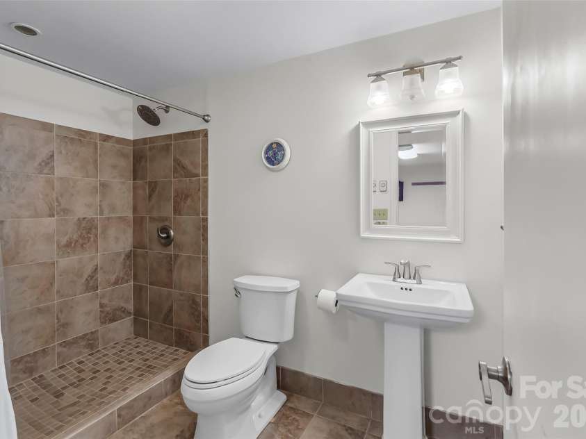 32 Swanns View Drive, Marion, NC 28752.  MLS# CAR4398128, YatesRealty ID 37311. Lower level bathroom