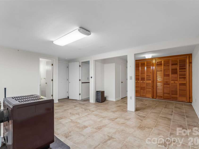32 Swanns View Drive, Marion, NC 28752.  MLS# CAR4398128, YatesRealty ID 37311. Lower level flex space