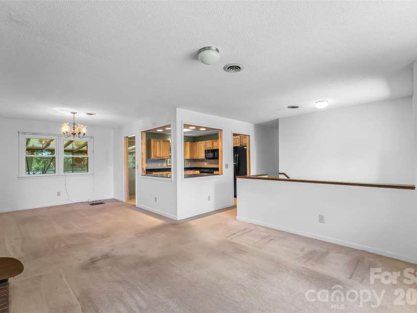 32 Swanns View Drive, Marion, NC 28752.  MLS# CAR4398128, YatesRealty ID 37311. Open dining, living kitchen area