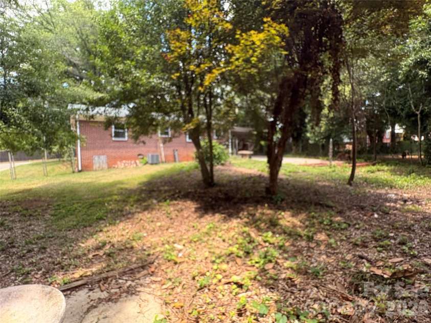 725 5th Avenue, Hickory, NC 28602.  MLS# CAR4401316, YatesRealty ID 37312. View of backyard