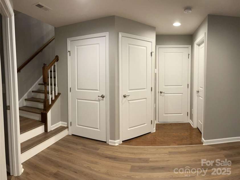 11724 Blessington Road, Huntersville, NC 28978.  MLS# CAR4220282, YatesRealty ID 3732. Lower Level Utility Closet and Access to Garage