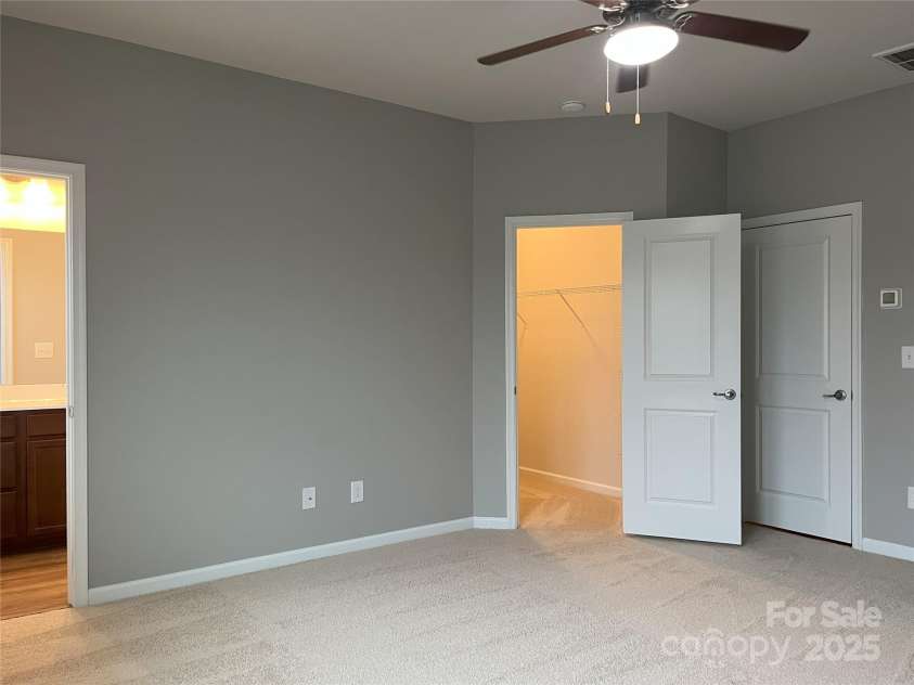 11724 Blessington Road, Huntersville, NC 28978.  MLS# CAR4220282, YatesRealty ID 3732. Master Bedroom with En Suite Bath and Walk in Closet