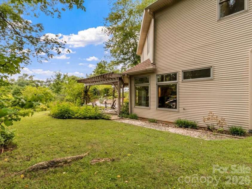 96 Woodrow Avenue, Asheville, NC 28801.  MLS# CAR4398741, YatesRealty ID 37321. Side yard