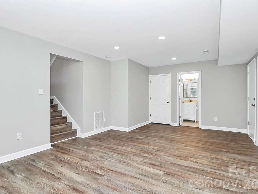 9546 Fairway Ridge Road, Charlotte, NC 28277.  MLS# CAR4403165, YatesRealty ID 37323. Lower level bonus room with access to outside