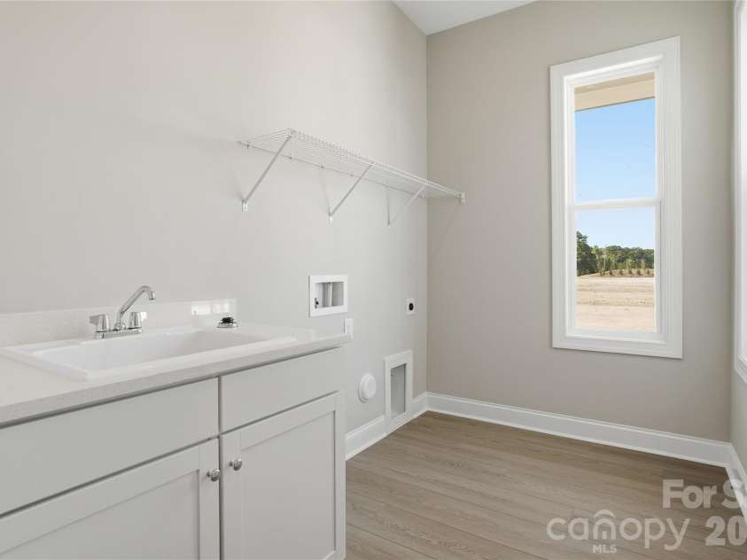 122 Marina Bay Trail, Locust, NC 28097.  MLS# CAR4388048, YatesRealty ID 37327. Laundry Room