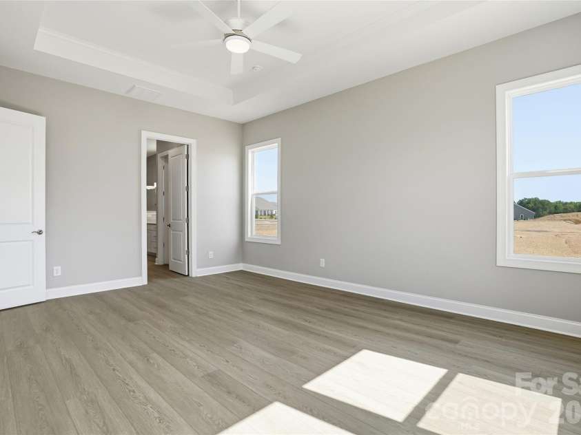 122 Marina Bay Trail, Locust, NC 28097.  MLS# CAR4388048, YatesRealty ID 37327. Primary Suite