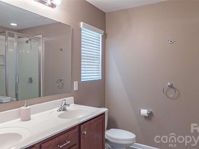 14408 Glendon Hall Lane, Charlotte, NC 28262.  MLS# CAR4396938, YatesRealty ID 37328. Primary Bath