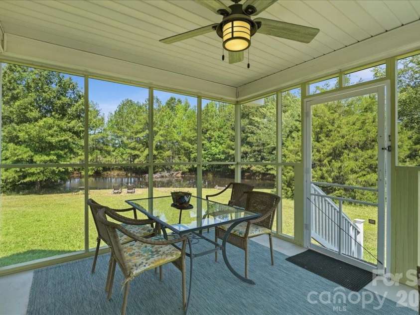 1506 Sandy Ridge Road, Monroe, NC 28112.  MLS# CAR4400348, YatesRealty ID 37346. Screened Porch