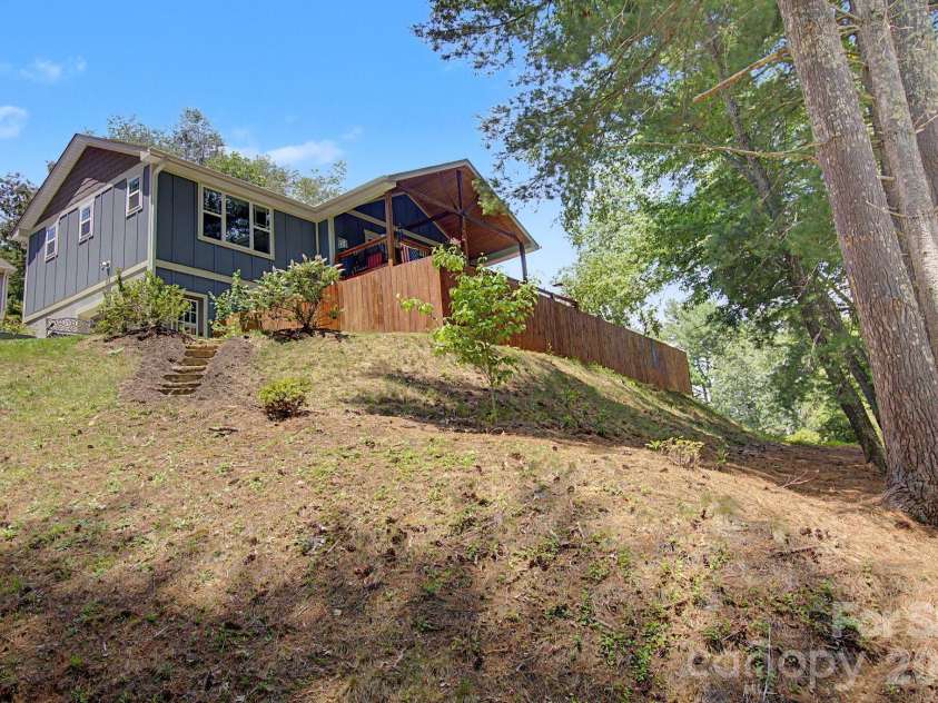 34 Aster Ridge Drive, Waynesville, NC 28786.  MLS# CAR4399718, YatesRealty ID 37351. Backyard View