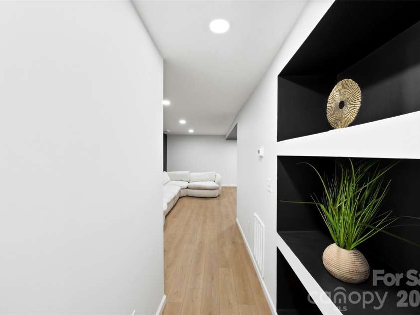 1047 White Plains Road, Charlotte, NC 28213.  MLS# CAR4392181, YatesRealty ID 37353. Lower Level Hallway