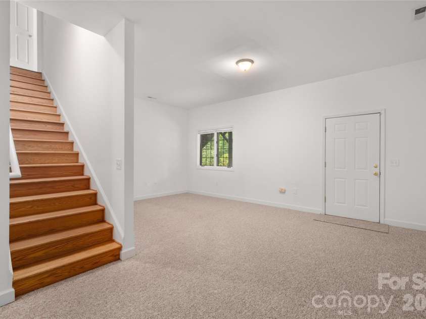 135 Buffalo Trail, Asheville, NC 28805.  MLS# CAR4394035, YatesRealty ID 37359. Finished daylight basement