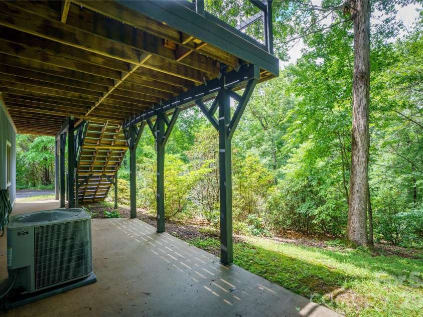 135 Buffalo Trail, Asheville, NC 28805.  MLS# CAR4394035, YatesRealty ID 37359. Patio under deck