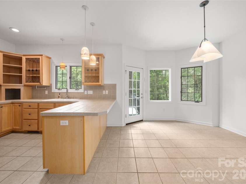 135 Buffalo Trail, Asheville, NC 28805.  MLS# CAR4394035, YatesRealty ID 37359. To back deck