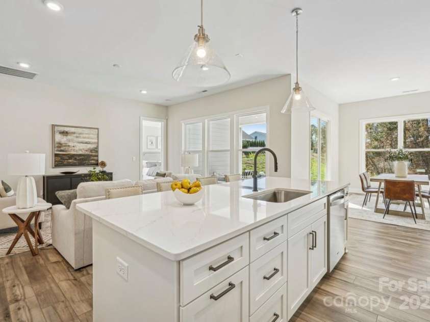 6019 Moonglade Way, Charlotte, NC 28269.  MLS# CAR4316419, YatesRealty ID 3736. Photos are of a previously built Mallard Model home and are for illustrative purposes only. Design selections, finishes, and features may vary in the actual home.