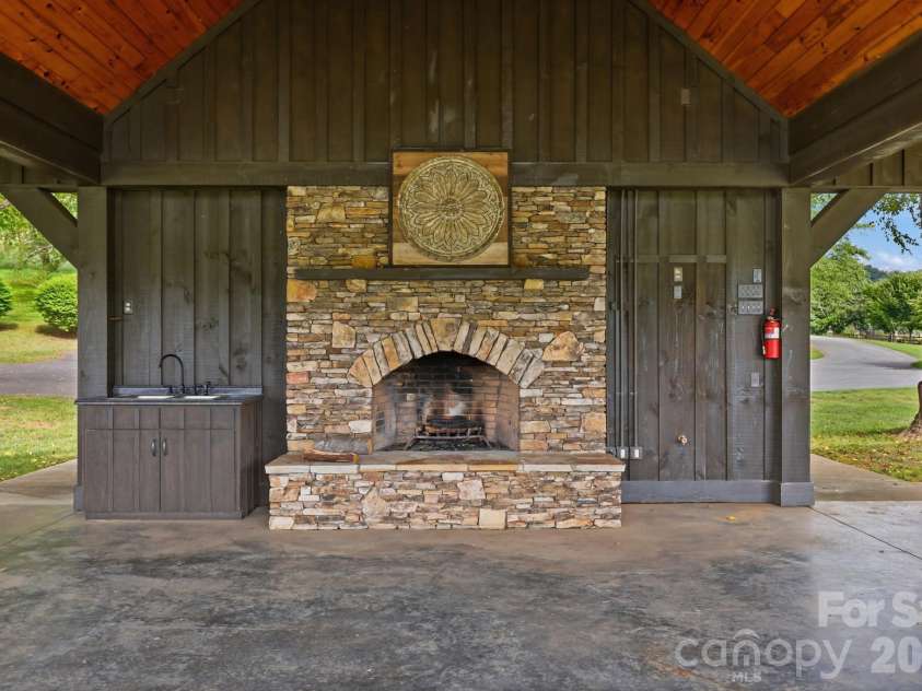 643 Landing Drive, Jefferson, NC 28640.  MLS# CAR4403187, YatesRealty ID 37369. Community Fireplace/Picnic area