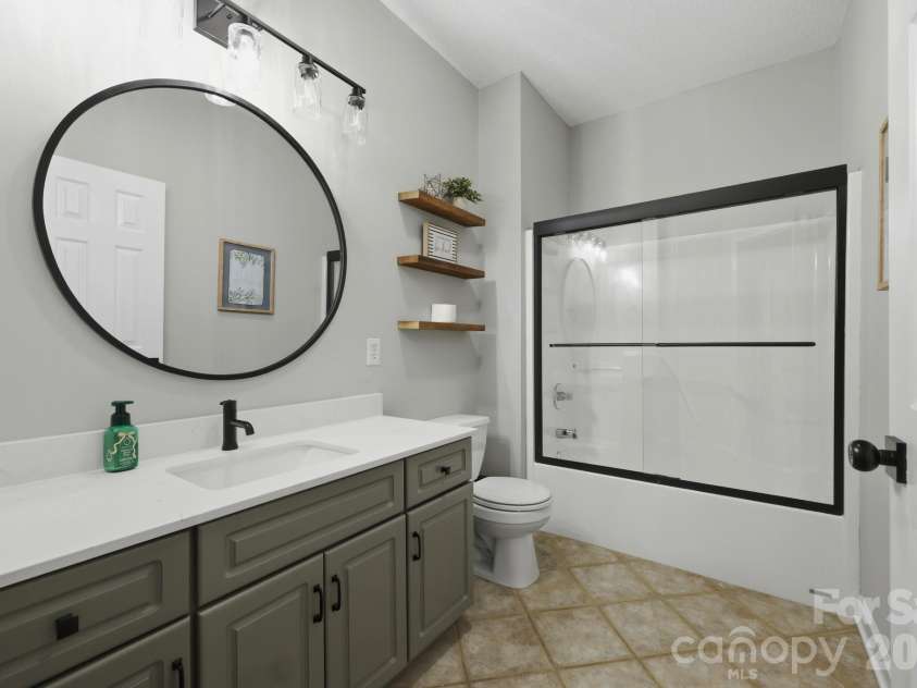 643 Landing Drive, Jefferson, NC 28640.  MLS# CAR4403187, YatesRealty ID 37369. Guest Bathroom #2 Main Level