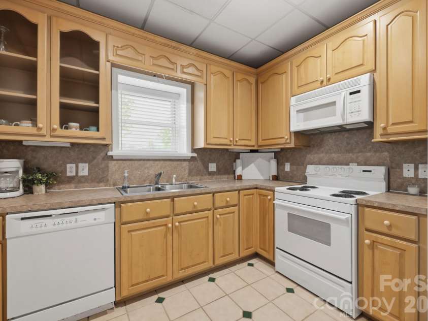 643 Landing Drive, Jefferson, NC 28640.  MLS# CAR4403187, YatesRealty ID 37369. Kitchen #2 Basement