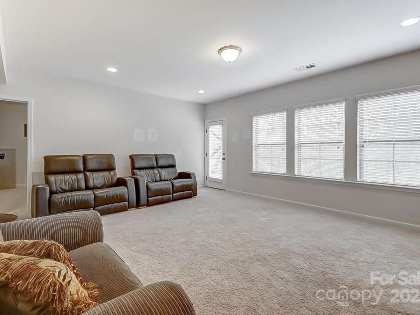 7006 Garden Hill Drive, Huntersville, NC 28078.  MLS# CAR4196907, YatesRealty ID 3738. Basement Family Room