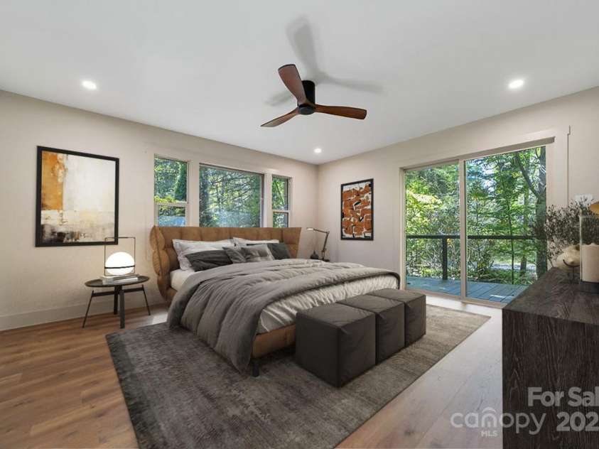 7321 Greenville Highway, Brevard, NC 28712.  MLS# CAR4302860, YatesRealty ID 3738. Bedroom with Deck Overlooking Stream